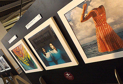 Framed vinyl records in an exhibition for the best record sleeves of 2014